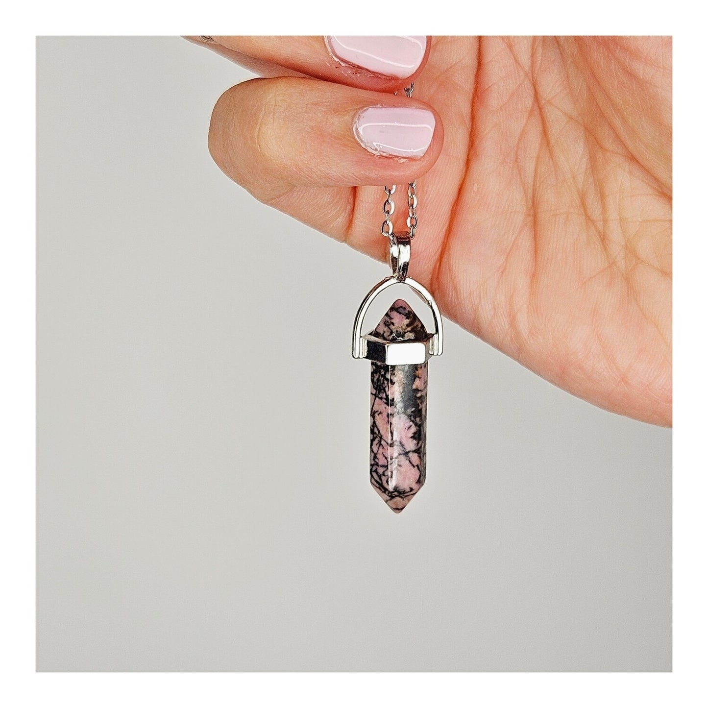 Dije rodonita pendulo (con cadena)