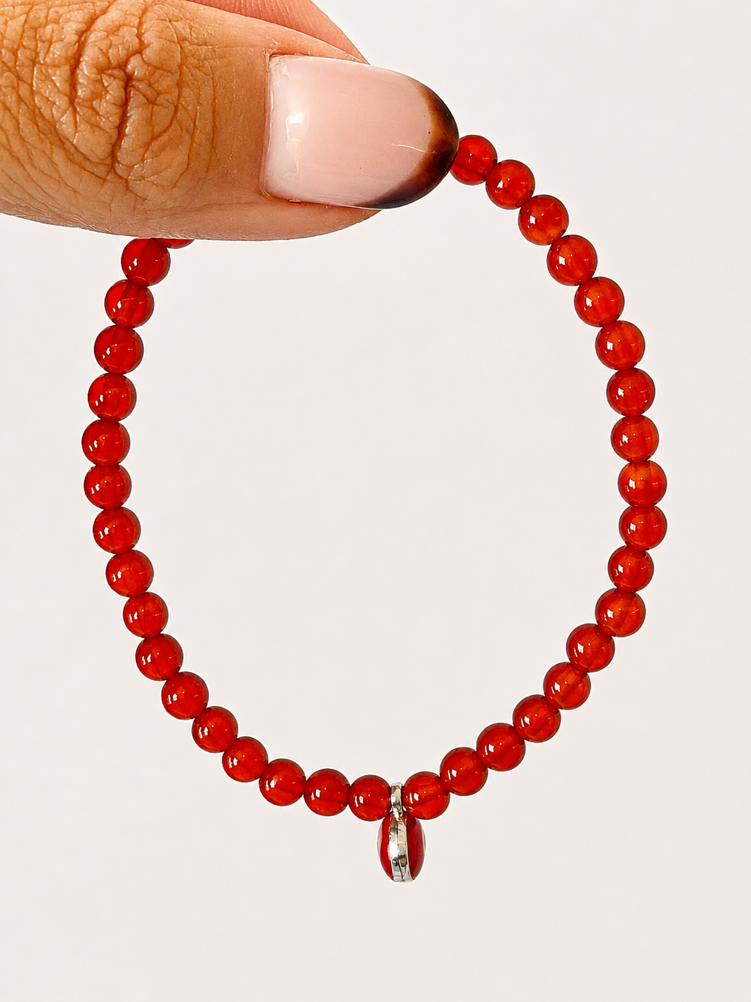 Pulsera cornalina con ojo turco 4mm